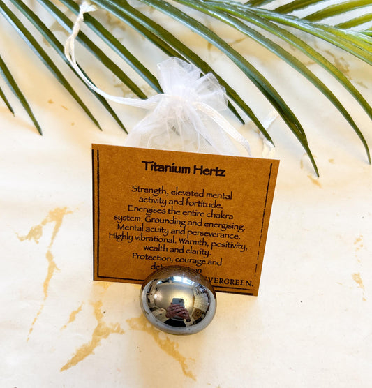 Titanium Hertz Crystal Tumbled Stone - Strength, Grounding & Positivity