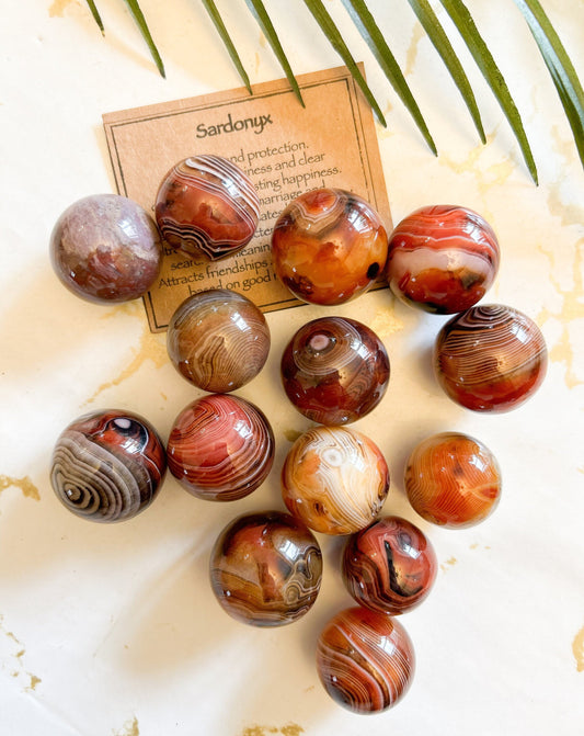 Sardonyx Crystal Sphere - Strength, Protection & Courage