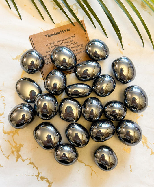 Titanium Hertz Crystal Tumbled Stone - Strength, Grounding & Positivity